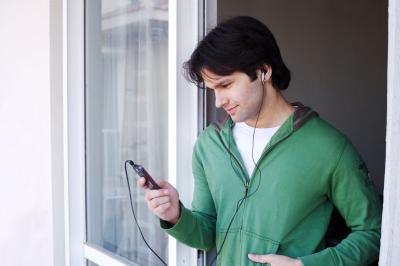 young man on ipod