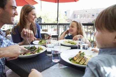 Family dining on a patio