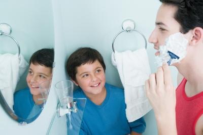 young man shaving