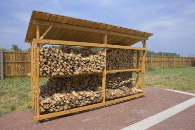 firewood storage structure with angled roof.