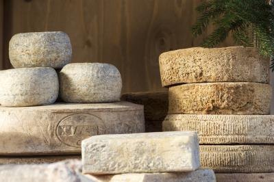 Gorgonzola is an uncooked cheese, usually aged for 3 to 4 months.
