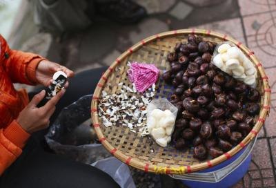 Water chestnuts being peeled