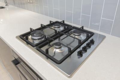 A gas range stove top.