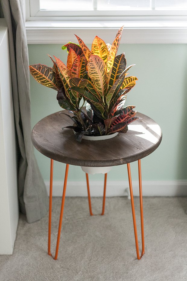 This durable DIY planter comes with its own table space.