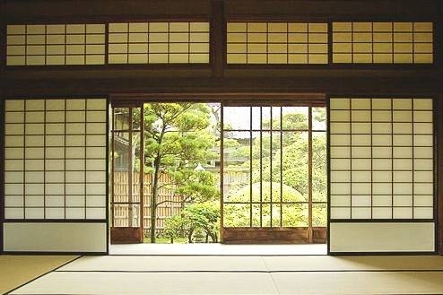 Tatami room with shoji-panel walls. Tatami room with shoji-panel walls.
