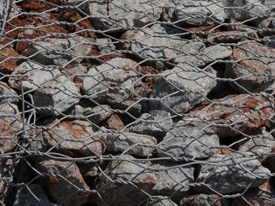 Gabions may contain basic rock or unique patterns and layers. Gabions may contain basic rock or unique patterns and layers.