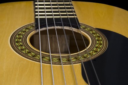 The serial number on Takamine guitars can be seen through the sound hole. The serial number on Takamine guitars can be seen through the sound hole.