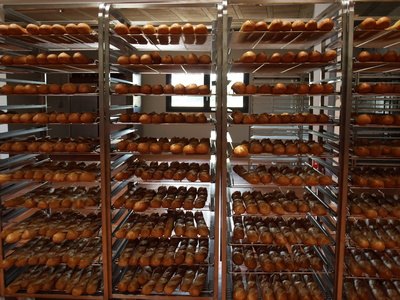 A bakery assistant needs to be ready to do any task required. A bakery assistant needs to be ready to do any task required.