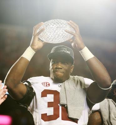 University of Alabama football player celebrates after winning the 2013 BCS championship University of Alabama football player celebrates after winning the 2013 BCS championship