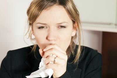 A woman coughing A woman coughing