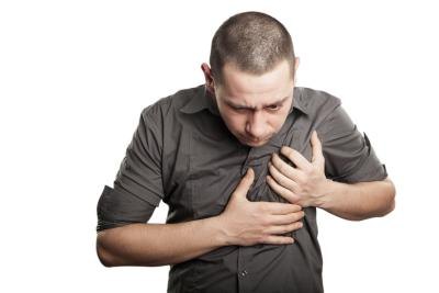 Man clutching chest. Man clutching chest.