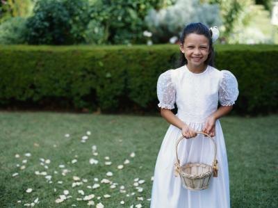 The tradition of a flower girl is symbolic in nature. The tradition of a flower girl is symbolic in nature.