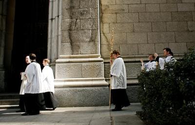 Clergymen walk past St. Patrick's church in New York. Clergymen walk past St. Patrick's church in New York.
