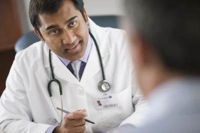 Doctor explaining to patient Doctor explaining to patient