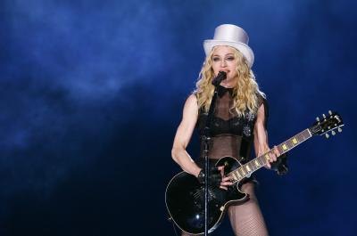 Madonna playing guitar Madonna playing guitar