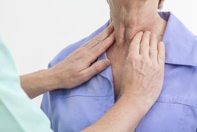Checking thyroid. Checking thyroid.