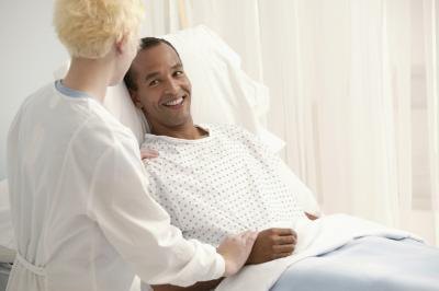 doctor talking to young man doctor talking to young man