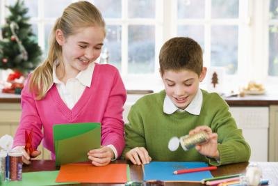 children making Christmas crafts children making Christmas crafts