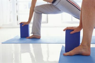 Yoga blocks can modify Bikram yoga poses to make the practice easier for beginners. Yoga blocks can modify Bikram yoga poses to make the practice easier for beginners.