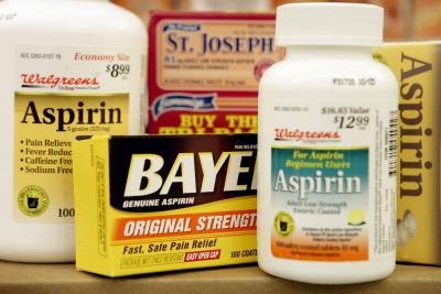 Aspirin products on a shelf Aspirin products on a shelf