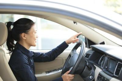 Woman using her own car for work Woman using her own car for work