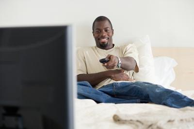 Man watching TV Man watching TV