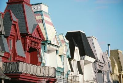 A close-up of Victorian style roof tops and balconies. A close-up of Victorian style roof tops and balconies.