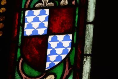 Coats of arms on a stained glass window Coats of arms on a stained glass window