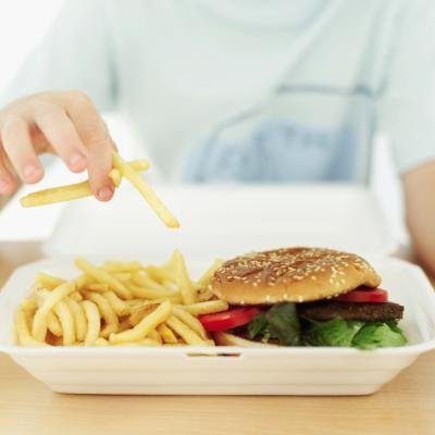 Person eating fast food Person eating fast food