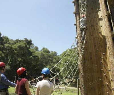 Adults and ladder for obstacle course. Adults and ladder for obstacle course.