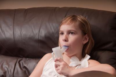 Young girl with breathing apparatus. Young girl with breathing apparatus.