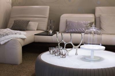 Bring in shiny glass and metal accents to give life to a monochrome brown space. Bring in shiny glass and metal accents to give life to a monochrome brown space.