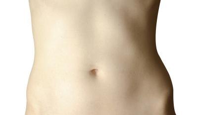 Close up of woman's bare torso. Close up of woman's bare torso.