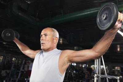Mature man training in the gym Mature man training in the gym