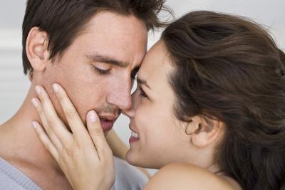 Woman smiling at man Woman smiling at man