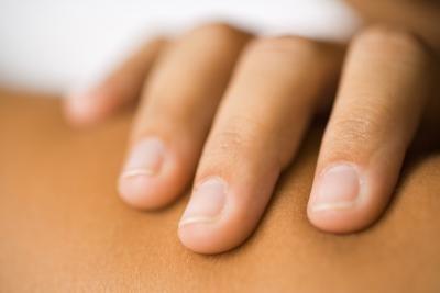 Woman touching skin Woman touching skin