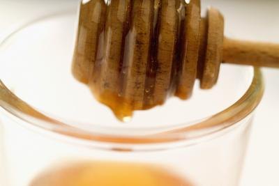 Honey stick in jar Honey stick in jar