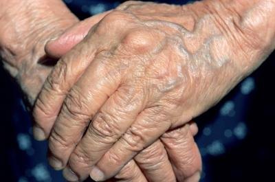 A older woman's hands. A older woman's hands.