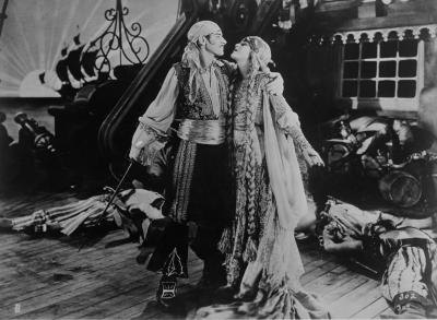 A romantic scene between a pirate and a damsel, circa 1918 A romantic scene between a pirate and a damsel, circa 1918