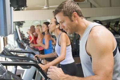 People with different body types on treadmills. People with different body types on treadmills.