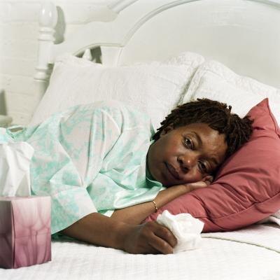Sick woman in bed. Sick woman in bed.