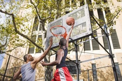 Men playing basketball. Men playing basketball.