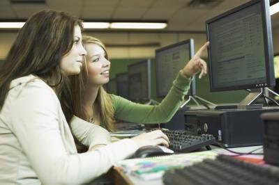 Students working on the computer Students working on the computer