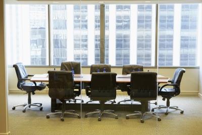 A conference room with a glass wall in an office in the financial district. A conference room with a glass wall in an office in the financial district.