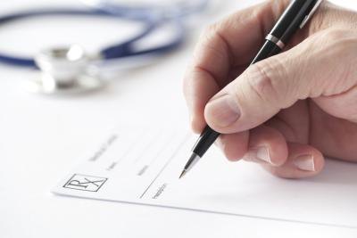 Doctor writing prescription Doctor writing prescription