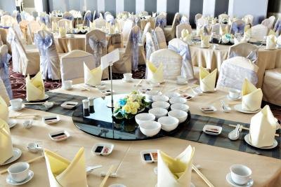 Banquet hall with decorations on table. Banquet hall with decorations on table.