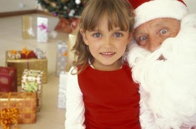 girl with santa at christmas party girl with santa at christmas party