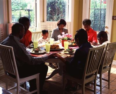 Family in prayer.