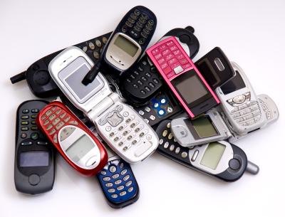 GSM phones in a pile.