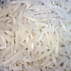 ¿Cuánto arroz y agua debería poner en una arrocera Aroma?